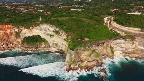 Epic Aerial Shot of Dramatic Ocean Cliff Edge and Waves in Bali Stock Footage 340658917