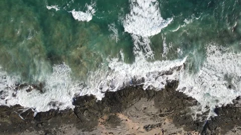 Epic aerial shot of ocean waves crashing into dramatic limestone cliffs, Great O Stock Footage 335983338