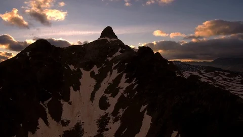Epic Aerial Sunset Over Mountains Stock Footage