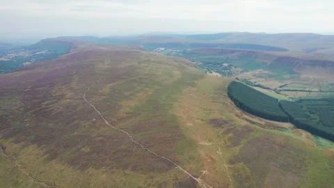 Epic aerial view of Black Mountain and Twyn Llech, famous hiking location i.. Stock Footage 342652242