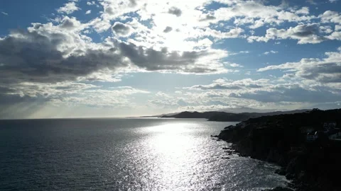 Epic aerial view, clouds, sunlight, Mediterranean shore and city, 4K Stock Footage 274843676