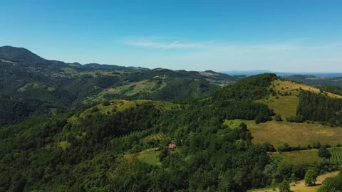 Epic Aerial View Flying Fast Over Green Meadow and Mountain Hills Stock Footage 342238063