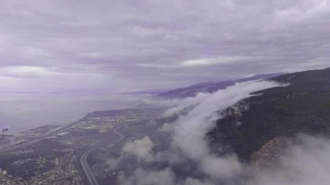 Epic Aerial View of Misty Mountains and Cloud Sea With Steep Cliffs l 4K Drone Stock Footage 332000177