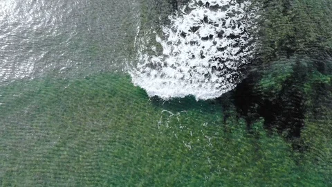 Epic aerial view of multi waves splashing motion,gradient blue sea water 4k Stock Footage 120921893
