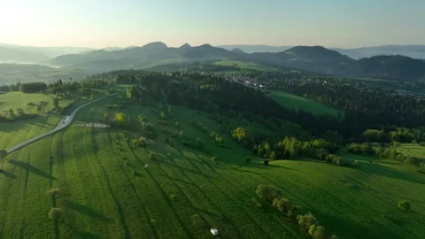 Epic aerial view of rolling green hills and pastures of Pieniny mountains i.. Stock Footage 335460155