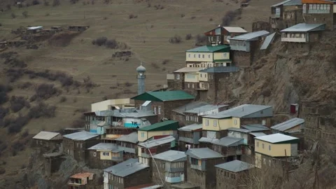 Epic aerial view of sildi aul among the scenic caucasus mountain landscape Stock Footage 200857122