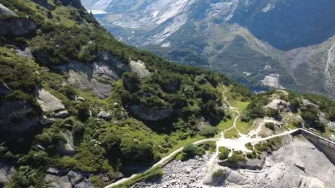 Epic Aerial View of Turquoise Alpine Lake and Mountain Landscape, 4K Drone. Video stock 322058057