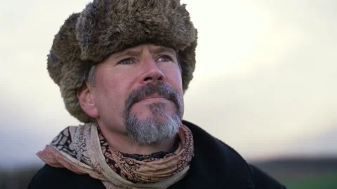 Epic and cinematic portrait of a handsome mature traveler with Wanderlust. Stock Footage 145321753