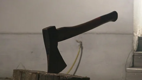 Epic Axe in the Log with smoke Stock Footage 117363533