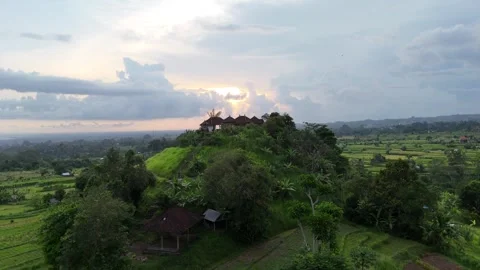 Epic Bali Sunset Drone Over Lush Rice Terraces &amp; Rainy Hills Stock Footage 321148103