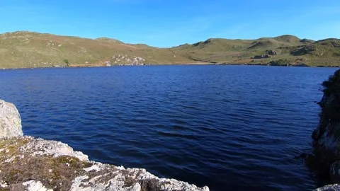 Epic blue water of Angle tarn Lake District national park cumbria hartsop UK Stock Footage 145326421