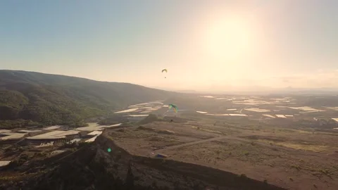 Epic Cinematic Drone View of Two Powered Paragliders Flying Over Dramatic Stock-Footage 346801466