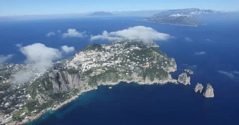 EPIC CINEMATIC PAN SHOT OF BEAUTIFUL SCENIC ISLAND OCEAN AND CLOUDS Stock Footage 63313402