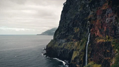 Epic cliffs with waterfall in overcast weather Stock Footage 193673974
