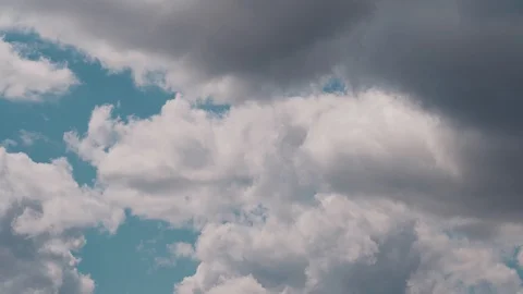 Epic clouds fly in the sky Stock Footage 128961738