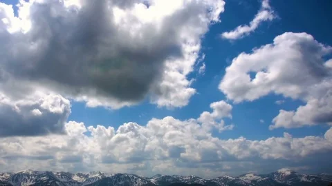 Epic clouds flying above mountain ridge. Timelapse shot. Stock Footage 81447299