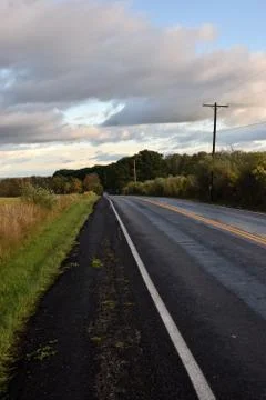 Epic Clouds at the Top of the HIl Stock Photos