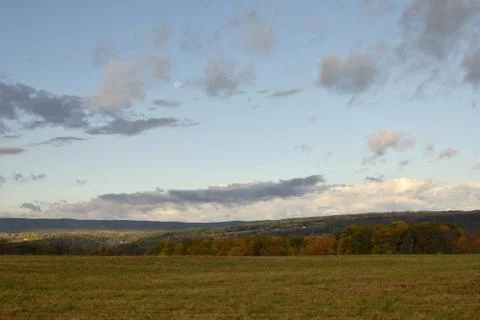 Epic Clouds at the Top of the HIl Stock Photos