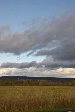 Epic Clouds at the Top of the HIl Stock Photos