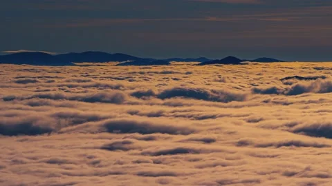 Epic colorful clouds waves moving fast in sunny nature at sunrise time lapse Stock Footage 143502213