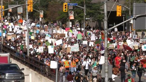 Epic Crowds Of Young students at climate change strike march in Toronto Canada Stock Photos