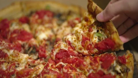 Epic deep dish slice being pulled slow motion Stock Footage 162012320