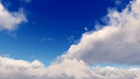 Epic dramatic cinematic blue sky white storm clouds time lapse seamless loop Stock Footage 93459183