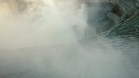 Epic dramatic shot of descent in mouth of an active, smoking volcano Stock Footage 269120545