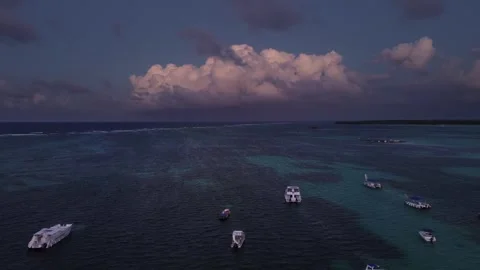 Epic dramatic sunset over the sea from a drone. Aerial view of dark water, waves Stock Footage 269937723