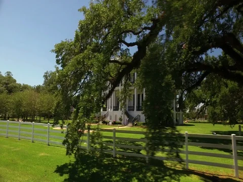 Epic drive by Nottoway Plantation Louisiana travel tourism historical landmark Stock Footage 76508420