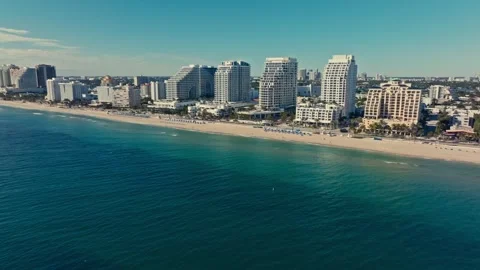 Epic Drone Aerial shot of Beach and Hotels in Fort Lauderdale Blue Ocean Stockbeeldmateriaal 280701480