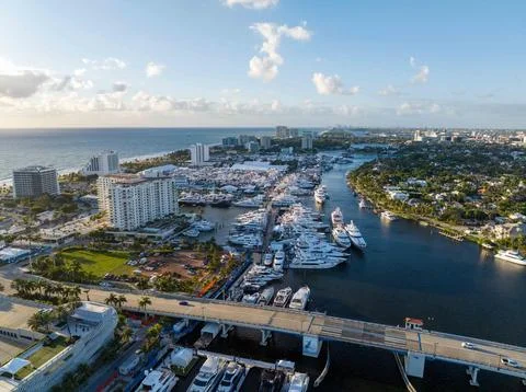 Epic drone capture of beach with multiple boats throughout entire frame Stock-Fotos