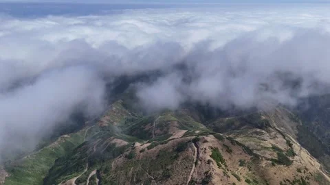 Epic Drone Flight Above Clouds Revealing Mountain Ridges in Madeira, Portugal Stock Footage 321134559