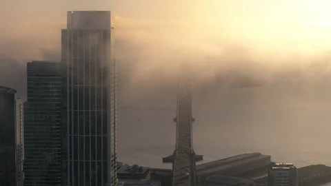 Epic drone flight in golden clouds covering downtown San Francisco at sunrise 4K Stock-Footage 261642225