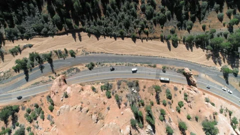 Epic drone flight through the natural arch in the red rock at Bryce Canyon. 4K Stock Footage 134572662