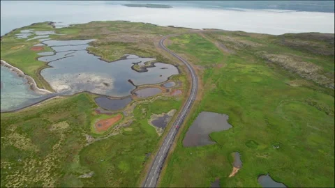 Epic Drone Follow Red Car Driving Iceland West Fjords Remote Island Stock Footage 258486065
