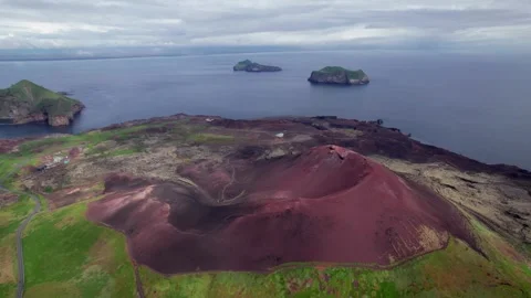 Epic Drone Over Eldfell Red Dormant Volcanic Cone to Ocean Coast Landscape Stock Footage 256688158