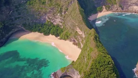 Epic drone pull back on unique and exotic tropical desert beach in Bali island Stock Footage 160158454