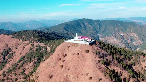 Epic Drone Shot of Hidden Hilltop Temple in the Himalayas – Kali Tibba, Shimla Stock Footage 330725611
