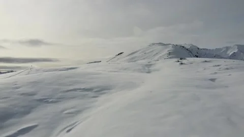 Epic drone shot of snowy Austrian peaks Stock Footage 145804275