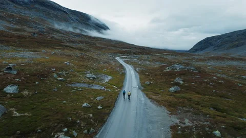 Epic drone shot of young cyclists enjoying ride Stock Footage 188476609