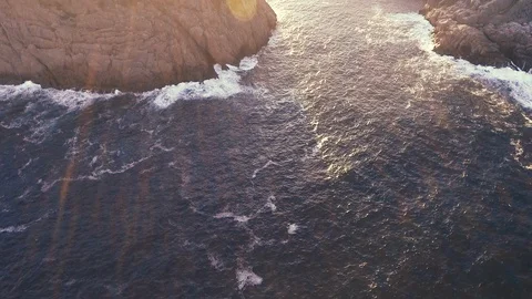 Epic Drone Tilt Up From Ocean to Civilization Stock Footage 101981087