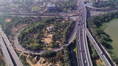 Epic drone timelapse showing traffic flow over a Bangalore flyover on a reg.. Video stock 328012333