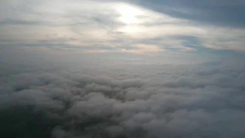 An epic drone view of cloudy sky with soft grey clouds creating calm and mo.. Vídeos de archivo 334319854