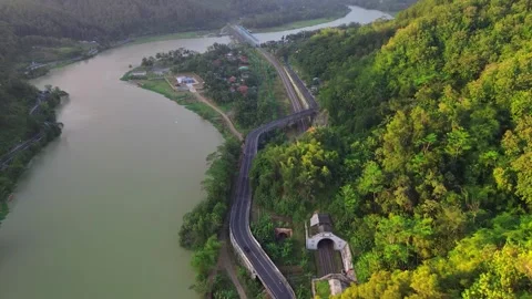 Epic Drone view of highway by river and hills Stock Footage 289966552