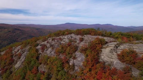 Epic Drone Wide Mountain Female Hiker Influencer Fall Foliage Stock Footage 255753652