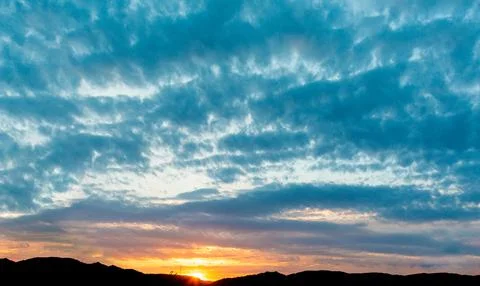Epic dusk in the sky with clouds. Copy space. Scenic abstract background 스톡 사진