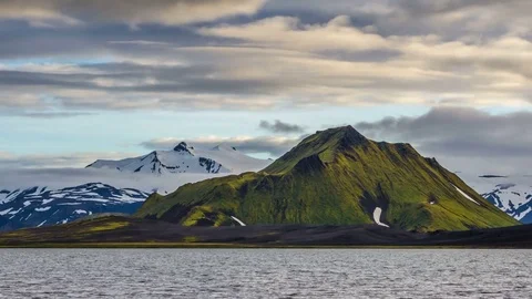 Epic evening by the lake under mountains on Iceland time lapse Stock Footage 84734657