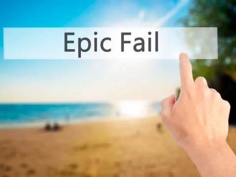 Epic Fail - Hand pressing a button on blurred background concept on visual sc 写真素材