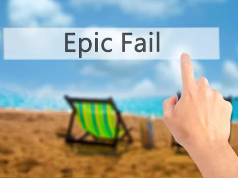 Epic Fail - Hand pressing a button on blurred background concept on visual sc Stock Photos